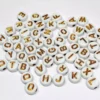 Cuentas Con Letra Dorada Curva - 50 gramos