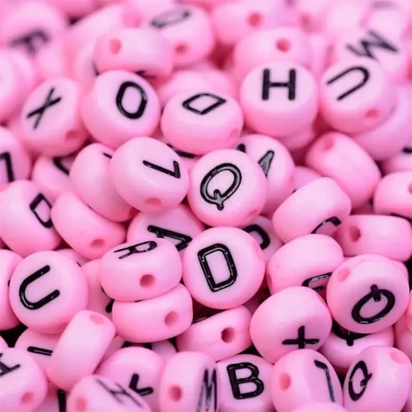 Cuentas Rosadas Con Letra Negra - 50 gramos